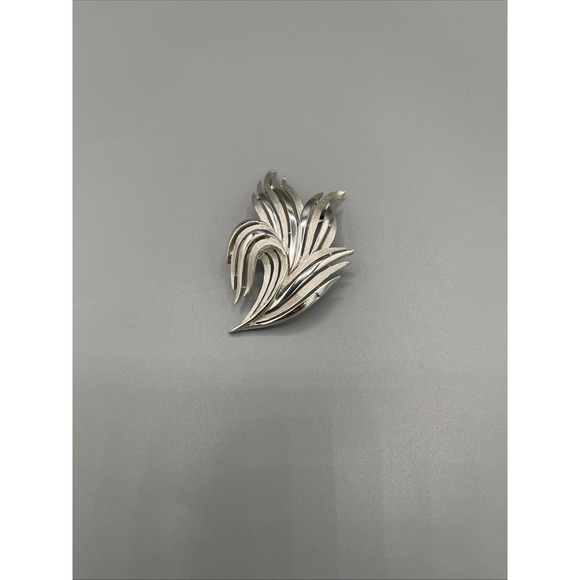 Trifari Jewelry - Vintage 1960s Trifari Silver-Tone Flame Brooch‎ | Sculptural Mid-Century Design